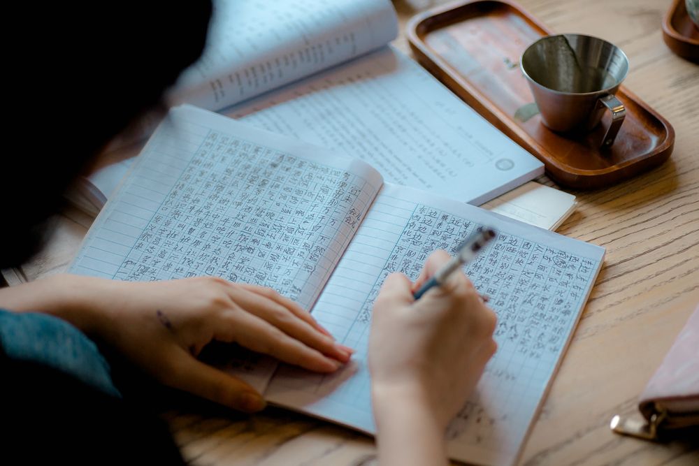 Writing Japanese characters in a notebook