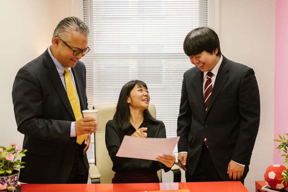 Colleagues talking in an office